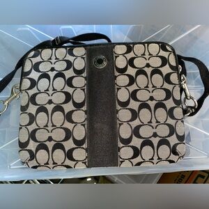 Coach tech case. Black and grey/silver. With adjustable strap.